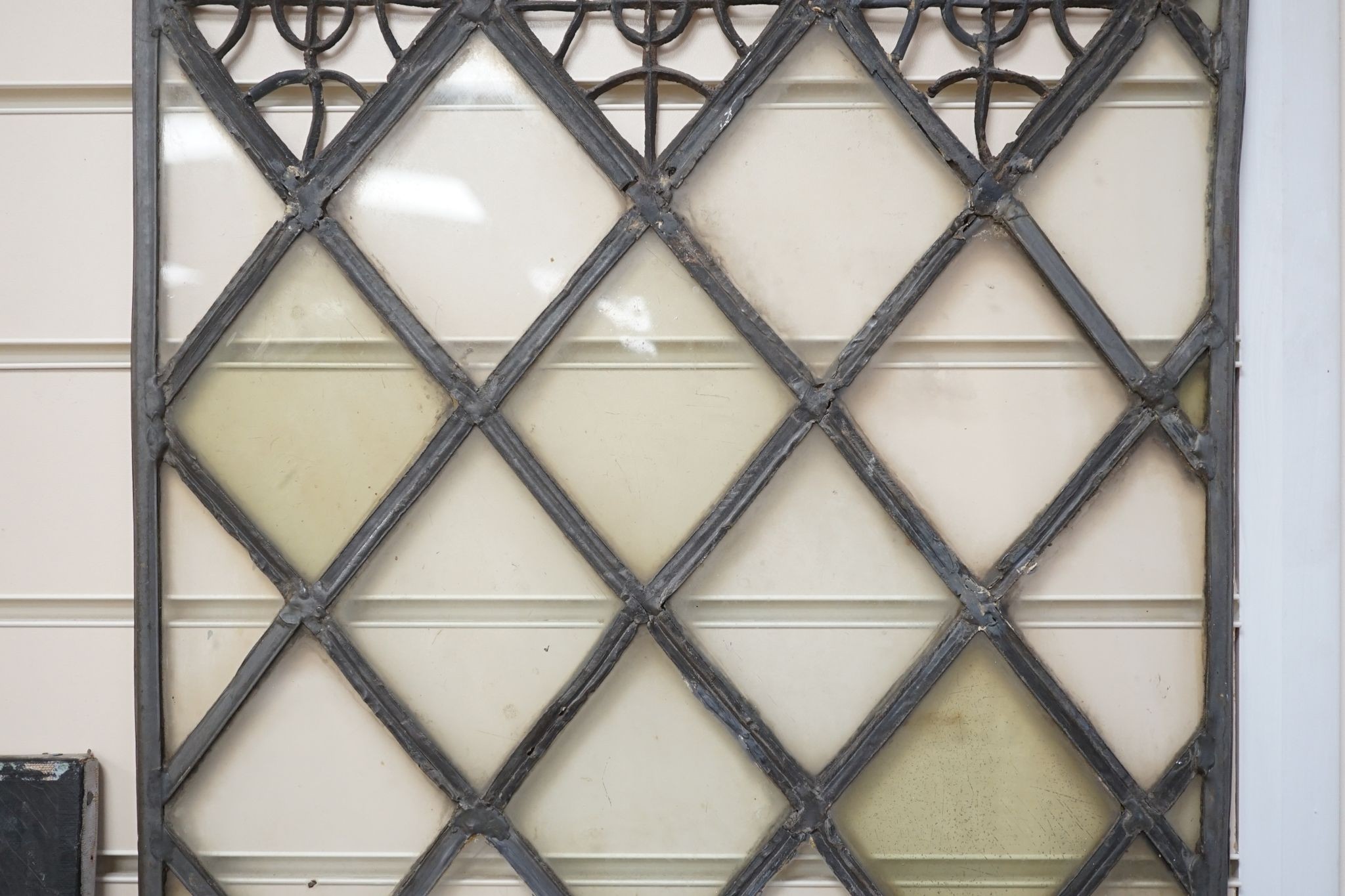 An antique lead and stained glass panel, possibly Elizabethan. 81x42cm